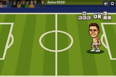 A soccer game is being played on a field.